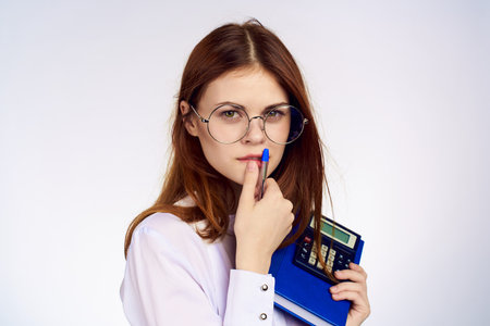 Business woman with calculator notepad working secretary