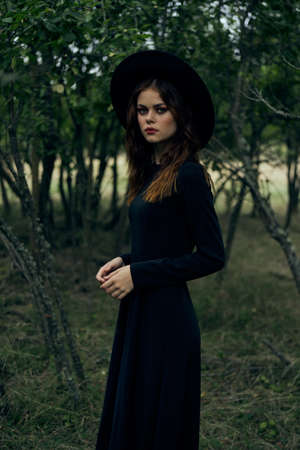 witch in the woods posing costume halloween gothic styleの写真素材