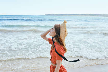 woman by the ocean beach start island landscape paradiseの写真素材
