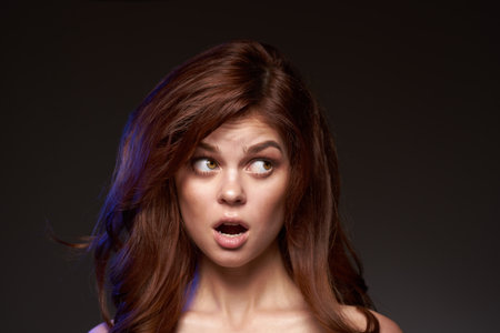 beautiful woman makeup posing naked shoulders hairstyle model lifestyleの写真素材