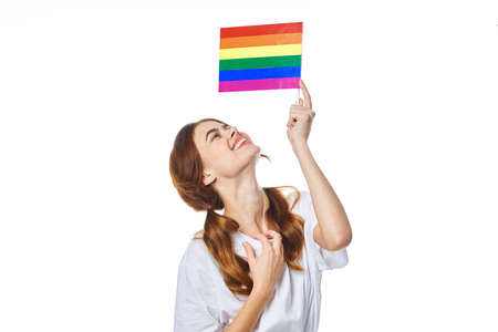 woman wearing white t-shirt lgbt flag inventor communityの写真素材