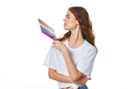woman with lgbt flag transgender community light backgroundの写真素材