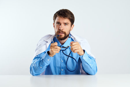 laboratory assistant sitting at his desk experiment analyzes medicine