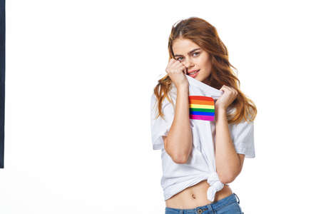 woman wearing white t-shirt lgbt flag inventor communityの写真素材