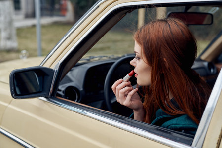 woman peeking out of car trip lifestyle fashion