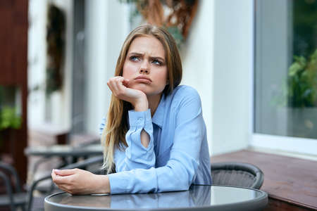 Business woman in a cafe outdoors fresh air summerの写真素材