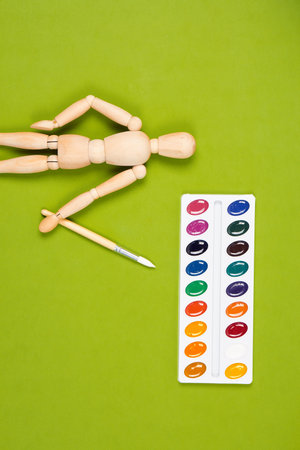 wooden mockup for painting paint brush art green background
