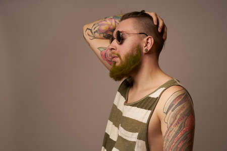 brutal man tattoos on his arms posing lifestyle form cropped viewの写真素材