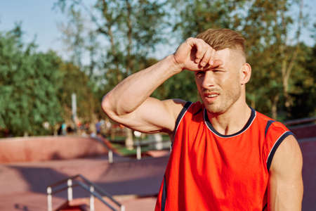 sports man on the playground in the park workoutの写真素材