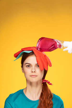 woman cleaning lady rubber gloves detergents houseworkの写真素材