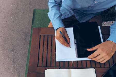 documents communication work lifestyle in a cafeの写真素材