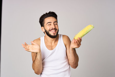 bearded man vegetables food diet strength snack light background