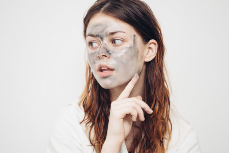 redhead woman facial mask skin care rejuvenation