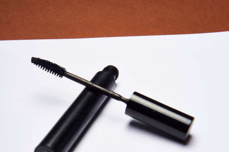 makeup brushes mascara accessories glamor brown backgroundの写真素材