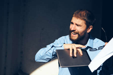 man with tablet working on the streetの写真素材