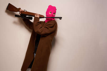 woman gangster danger crime fashion isolated backgroundの写真素材