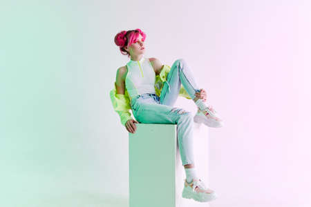 fashionable woman pink hair posing fashion clothes lifestyle fun designの写真素材