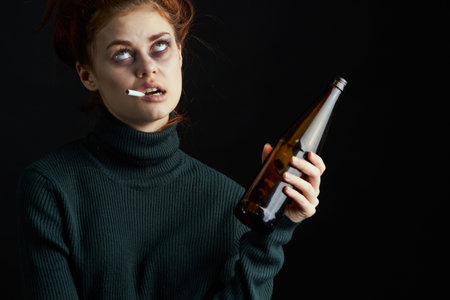 woman with bottle of alcohol bruises under eyes changes depression dark background