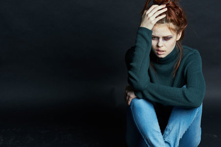 woman with bruises on her face problems domestic violence emotionsの写真素材