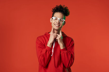 guy in red sweater posing heart holiday isolated background