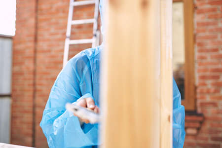woman wooden objects molars renovation housework decorationの写真素材