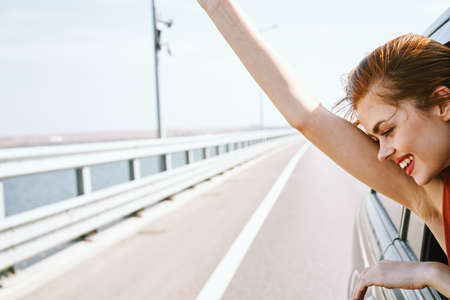 joyful woman trip travel fun vacation natureの写真素材