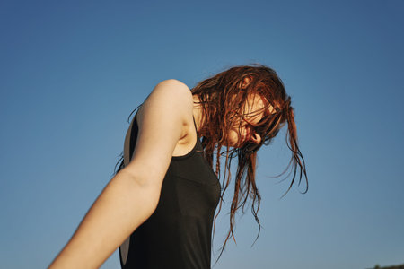 woman in black swimsuit sunglasses sun nature