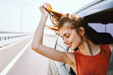 cheerful woman car ride road travel adventure