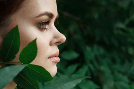 beautiful woman Cosmetology nature green leaves glamor Lifestyleの写真素材