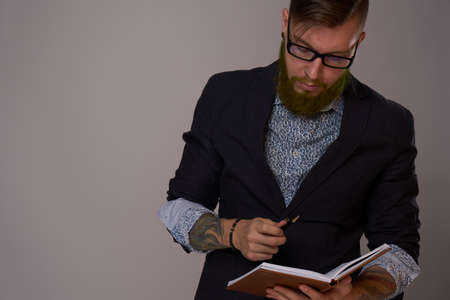 bearded man in jacket posing fashion Professionalの写真素材