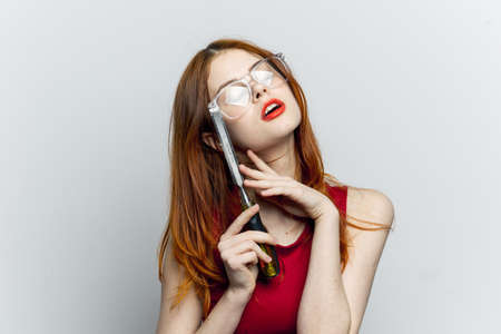 woman with glasses construction tool repair houseworkの写真素材