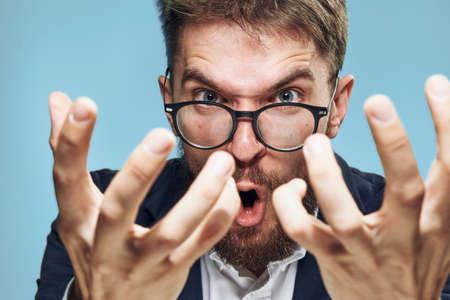 business man in suit posing emotions executive officeの写真素材