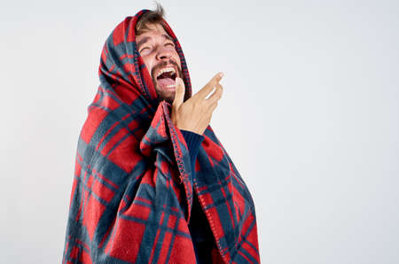 sick man took refuge betraying emotions discontent coldの写真素材