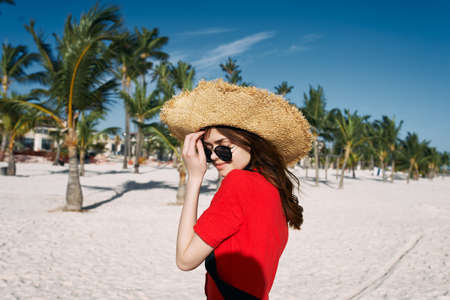 woman in hat on island landscape summer tropicsの写真素材