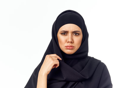 muslim woman with black hijab gifts holiday close-up