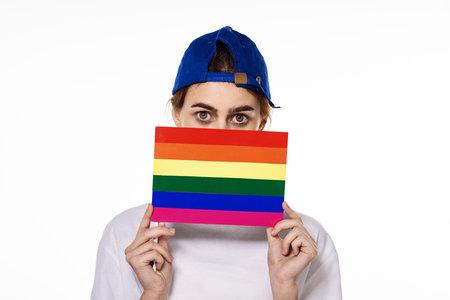 woman wearing white t-shirt lgbt flag inventor community