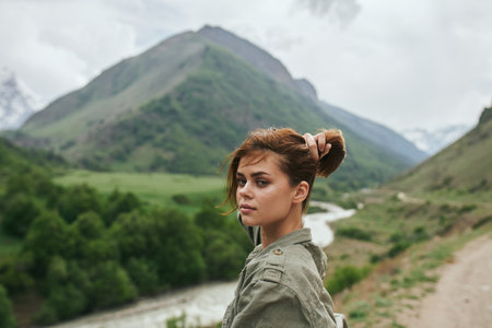 woman hiker mountains landscape travel fresh air