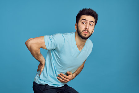 bearded man with headache migraine health problemの写真素材