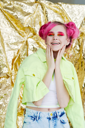 cheerful woman in dress posing isolated backgroundの写真素材