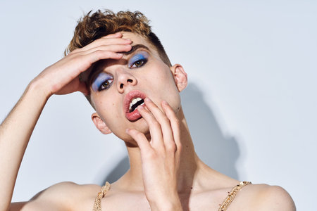 male transgender female makeup fashion posing studio