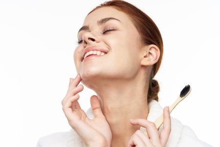 Woman in white coat toothbrush oral hygiene