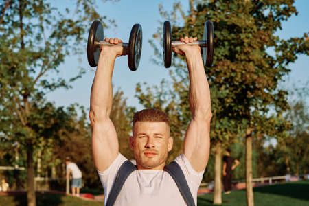 sportive man workout in the park morning motivationの写真素材