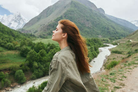 woman hiker mountains landscape travel fresh airの写真素材