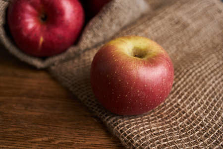 apples on a wooden table vitamins fresh fruits organicの写真素材