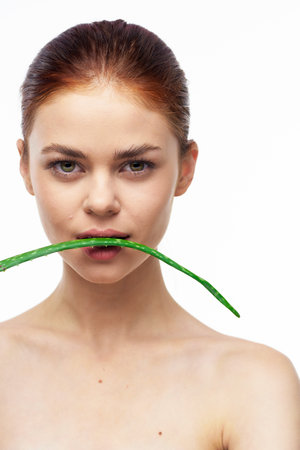 woman with bare shoulders aloe cosmetics spa treatmentsの写真素材