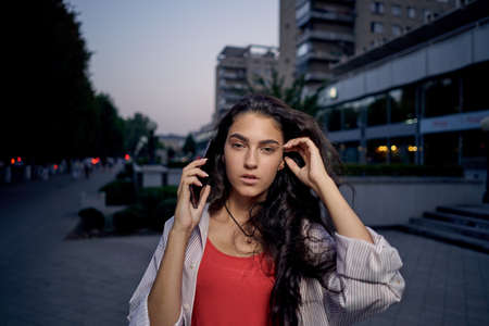 talking on the phone walking outdoors lifestyle fresh airの写真素材