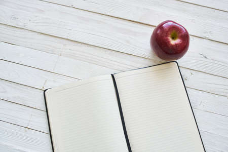diet notebook fruit healthy food breakfast light backgroundの写真素材