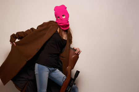 woman in pink mask danger crime fashion isolated background