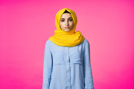 muslim woman in hijab posing fashion ethnicity pink background