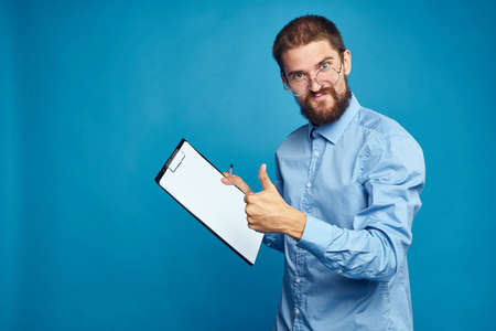 business man with glasses emotions blue backgroundの写真素材